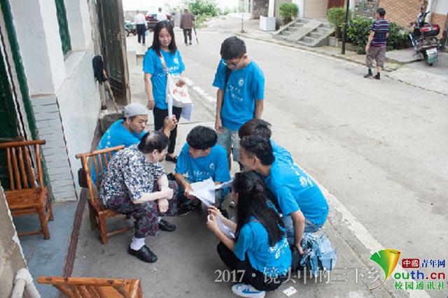 星空体育在线网页版志愿者探访老街 为灾后修复建言献策